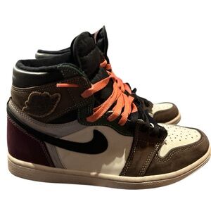 Retro Nike High-Top Sneakers with Orange and Brown Accents